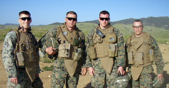 Capt. George Flynn '01 (left), who took a lunch-pail mindset to the Marines, chose to write about the Pylon value of service.