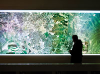 The center's visualization room features a 3-D display wall.