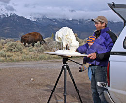 George Bumann '02 works with his son in tow