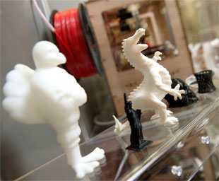 DreamVendor, a 3-D printing machine, allows students to create small objects in quick fashion. Photo by Logan Wallace.