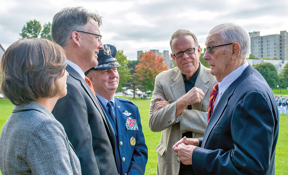 From right: Ben Ames '48, Ben Ames Jr., Commandant Maj. Gen. Randal Fullhart, President Timothy D. Sands, and Professor Laura P. Sands