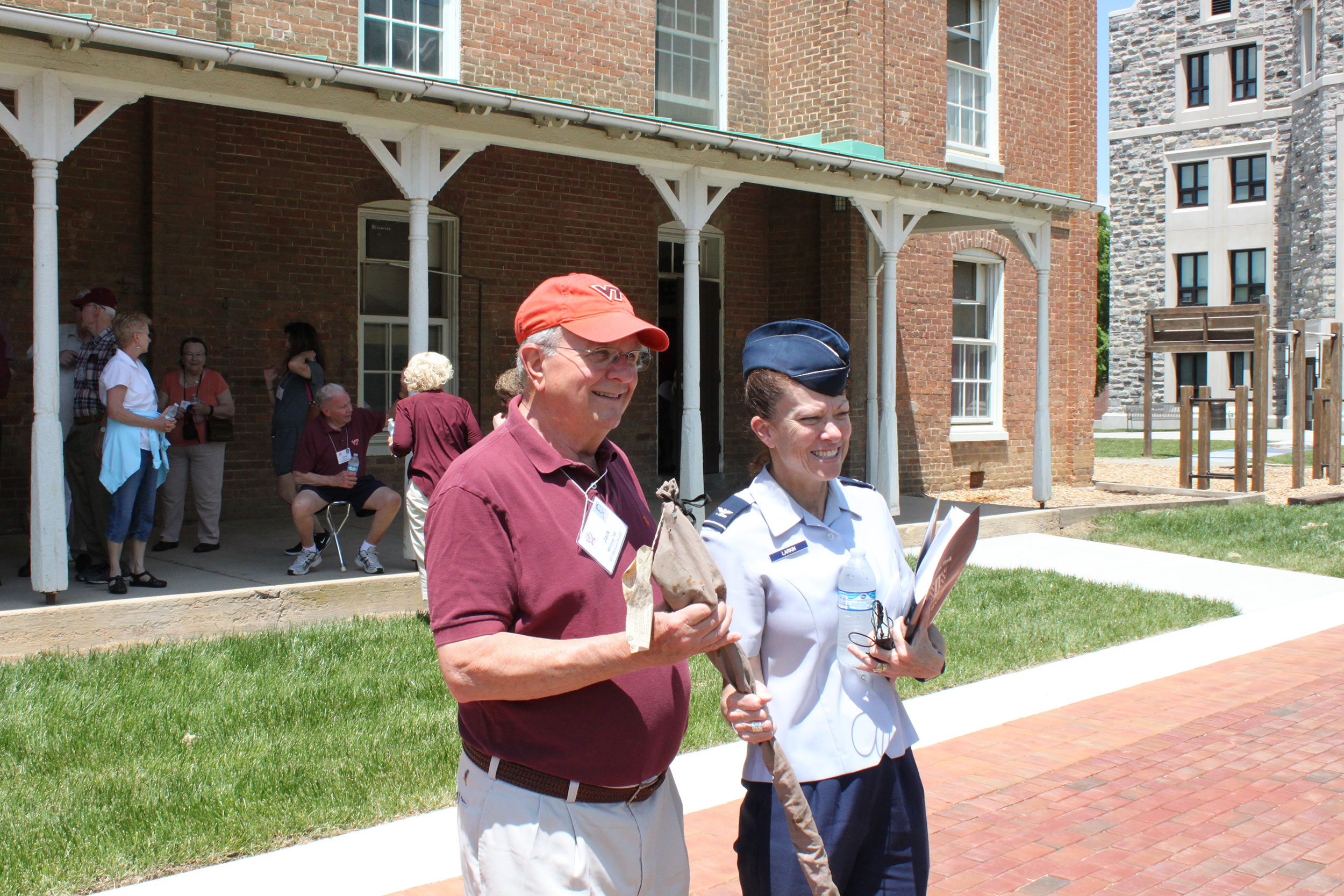 Col. Patience Larkin accepts a saber donated by Jack Whitney ’66