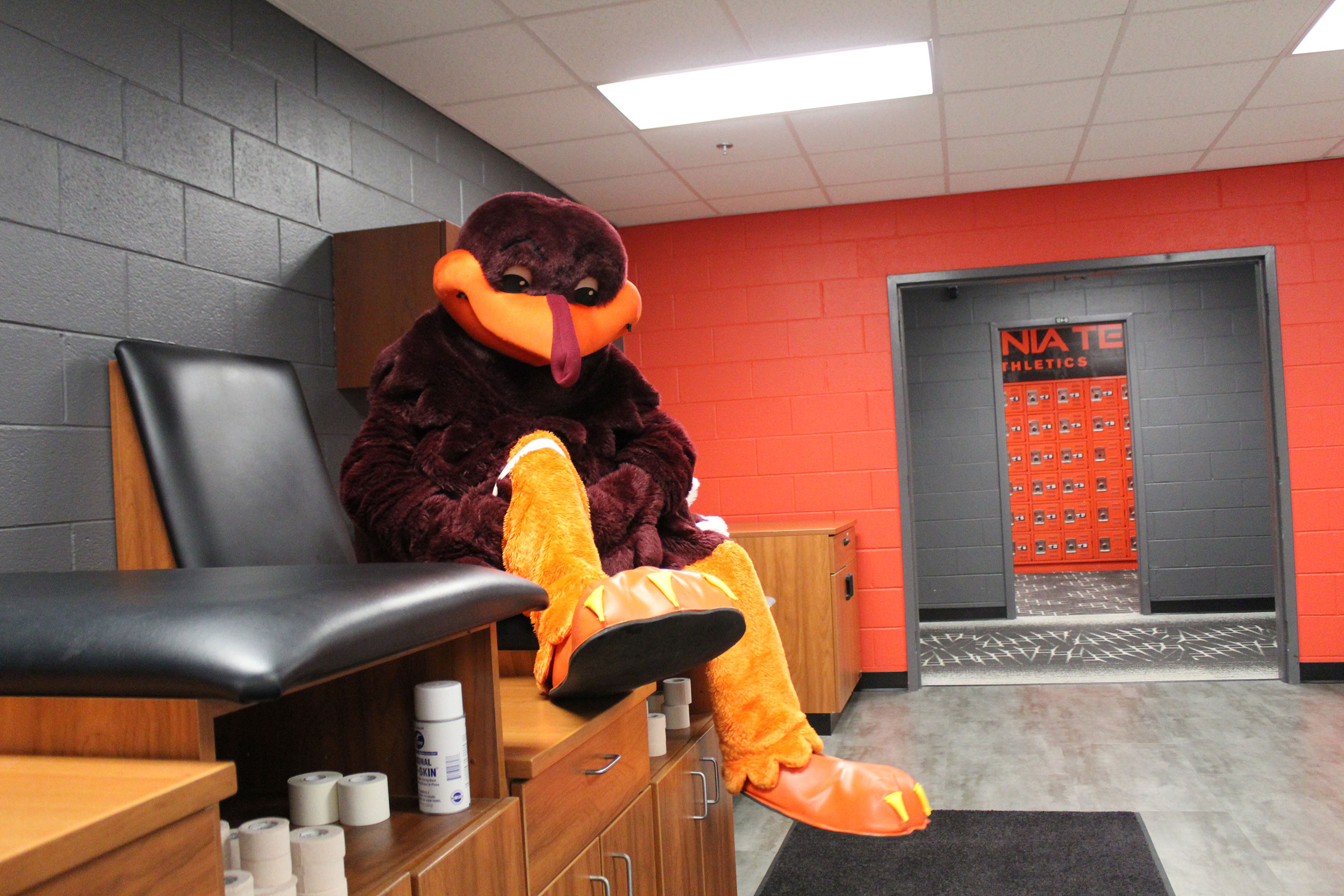 The HokieBird visits the training room