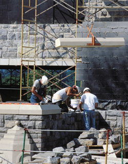 Stonemasons work with Hokie Stone on the Virginia Tech campus.