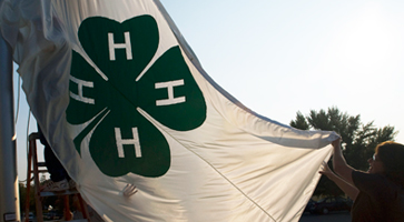 The 4-H flag being hung at the W.E. Skelton 4-H Educational Conference Center at Smith Mountain Lake, Va.