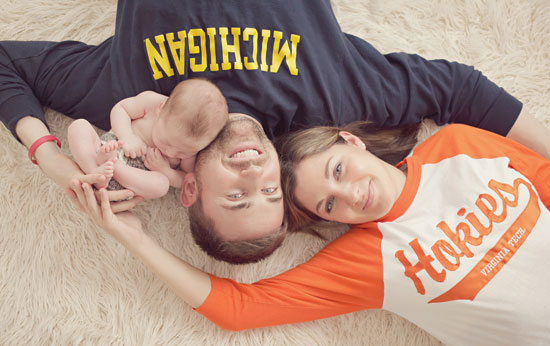 Lauren Duvall Heisey '02 and her husband, Chris, with their son; photo by Tonya Teran.