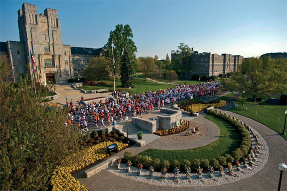 Participants in the 2010 Run in Remembrance pass by the April 16 Memorial. Photo by John McCormick.