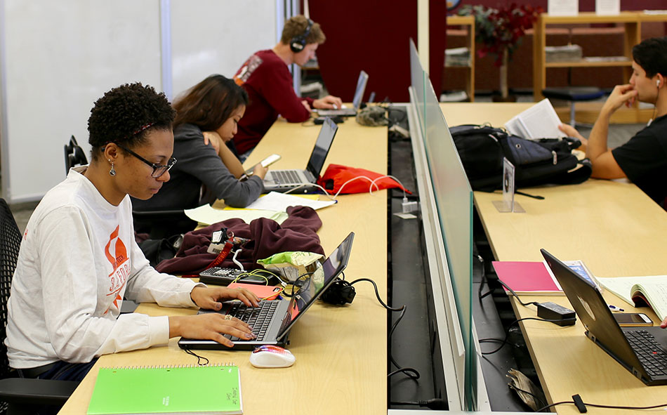 Virginia Tech students in Newman Library