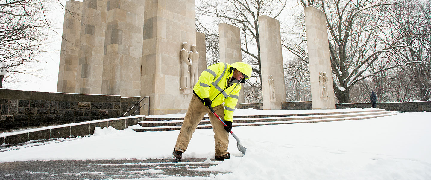 Virginia Tech staff clears snow after a storm