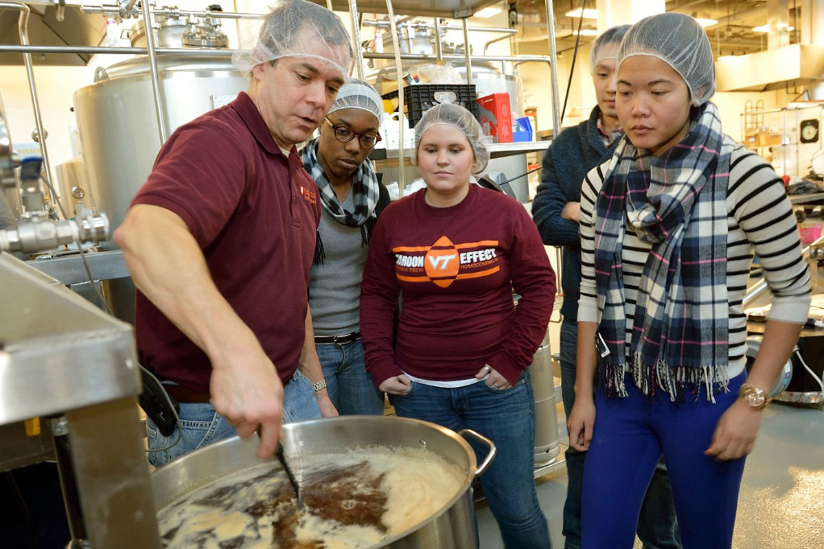 Bruce Herbert with students in Virginia Tech's brewhouse