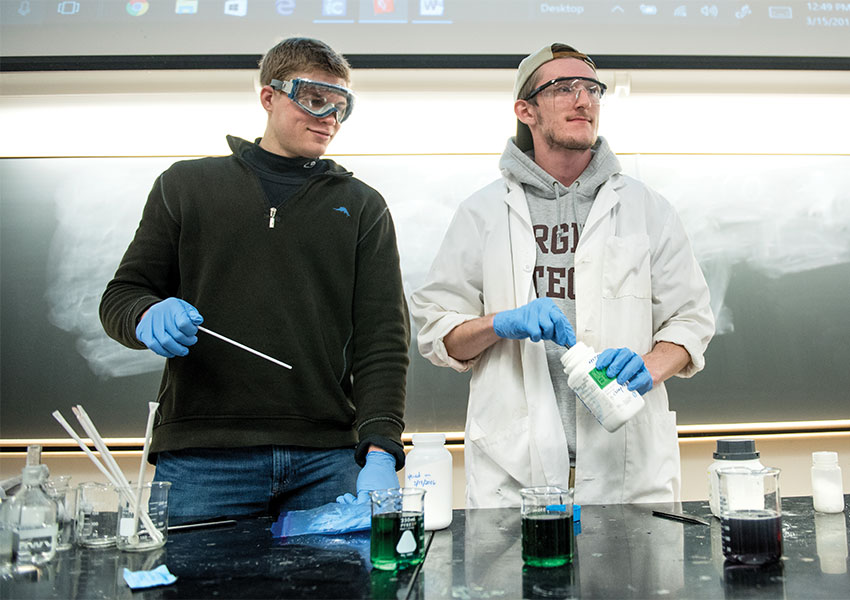 Virginia Tech students conducting an experiment in class