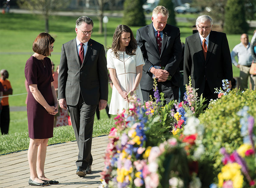 From left: Professor Laura Sands, Virginia Tech President Tim Sands, Dori McAuliffe, Virginia Gov. Terry McAuliffe, and university President Emeritus Charles W. Steger at the April 16 Memorial