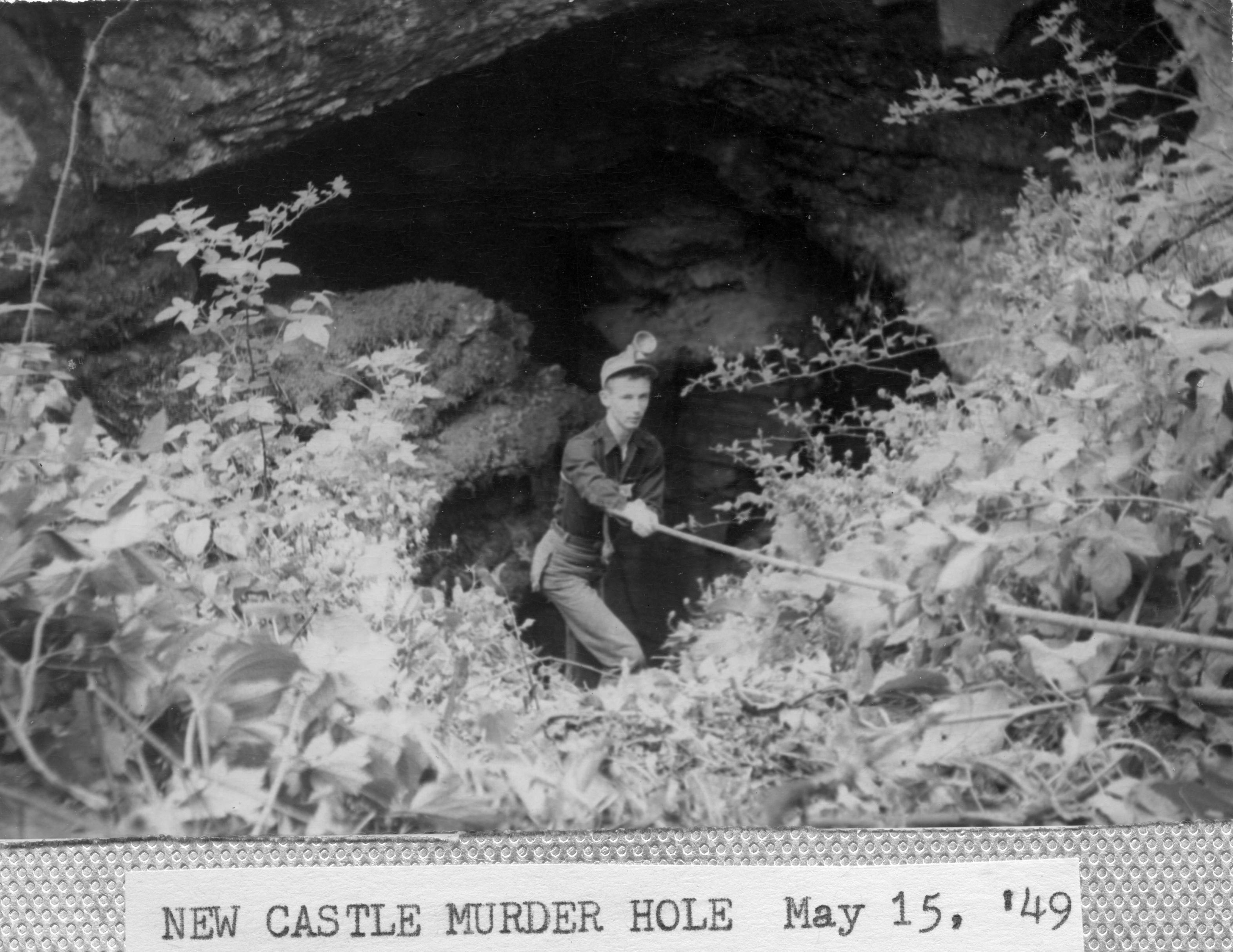 A caver at entrance to Catawba Murder Hole near New Castle in May 1949