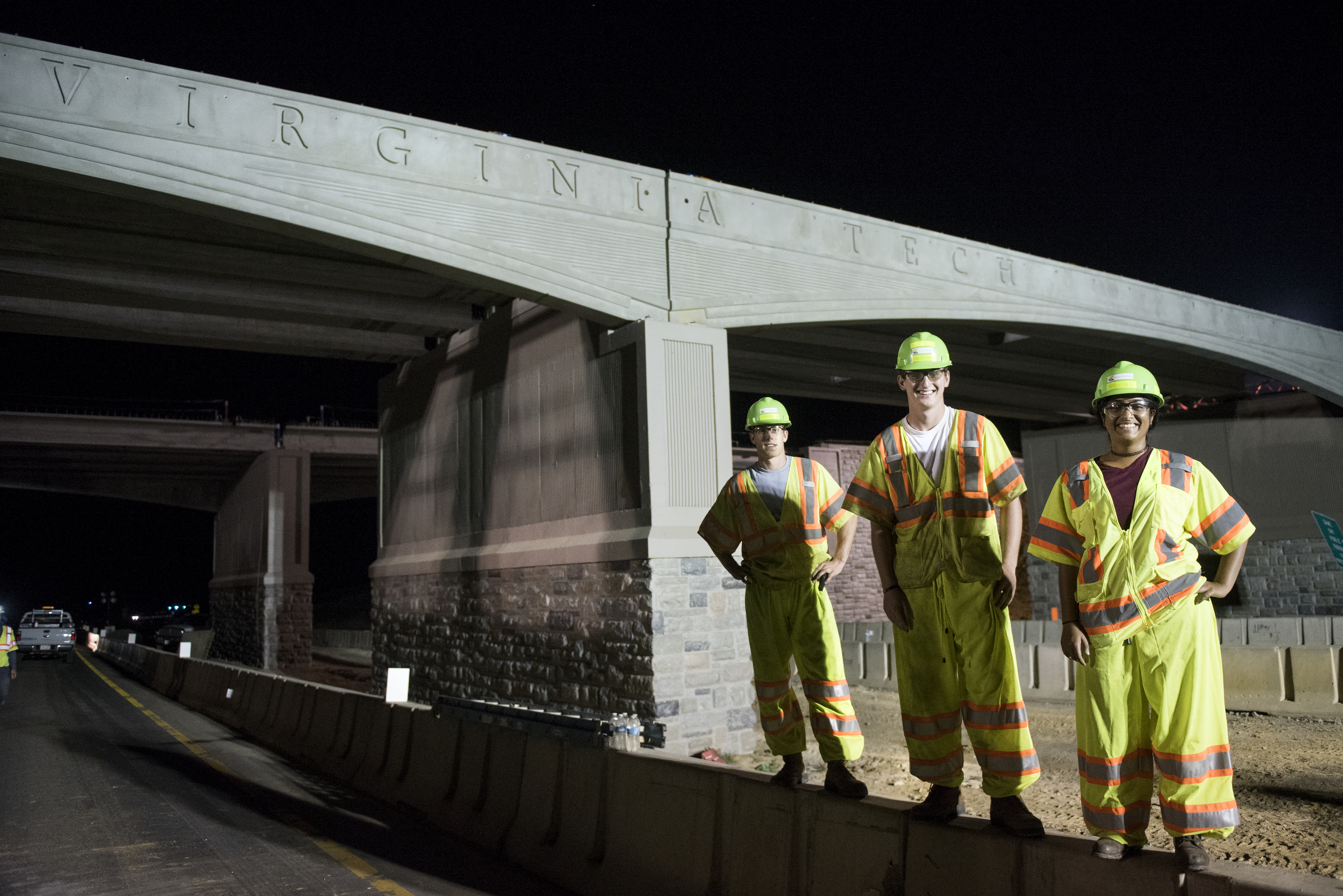 three student interns at highway project