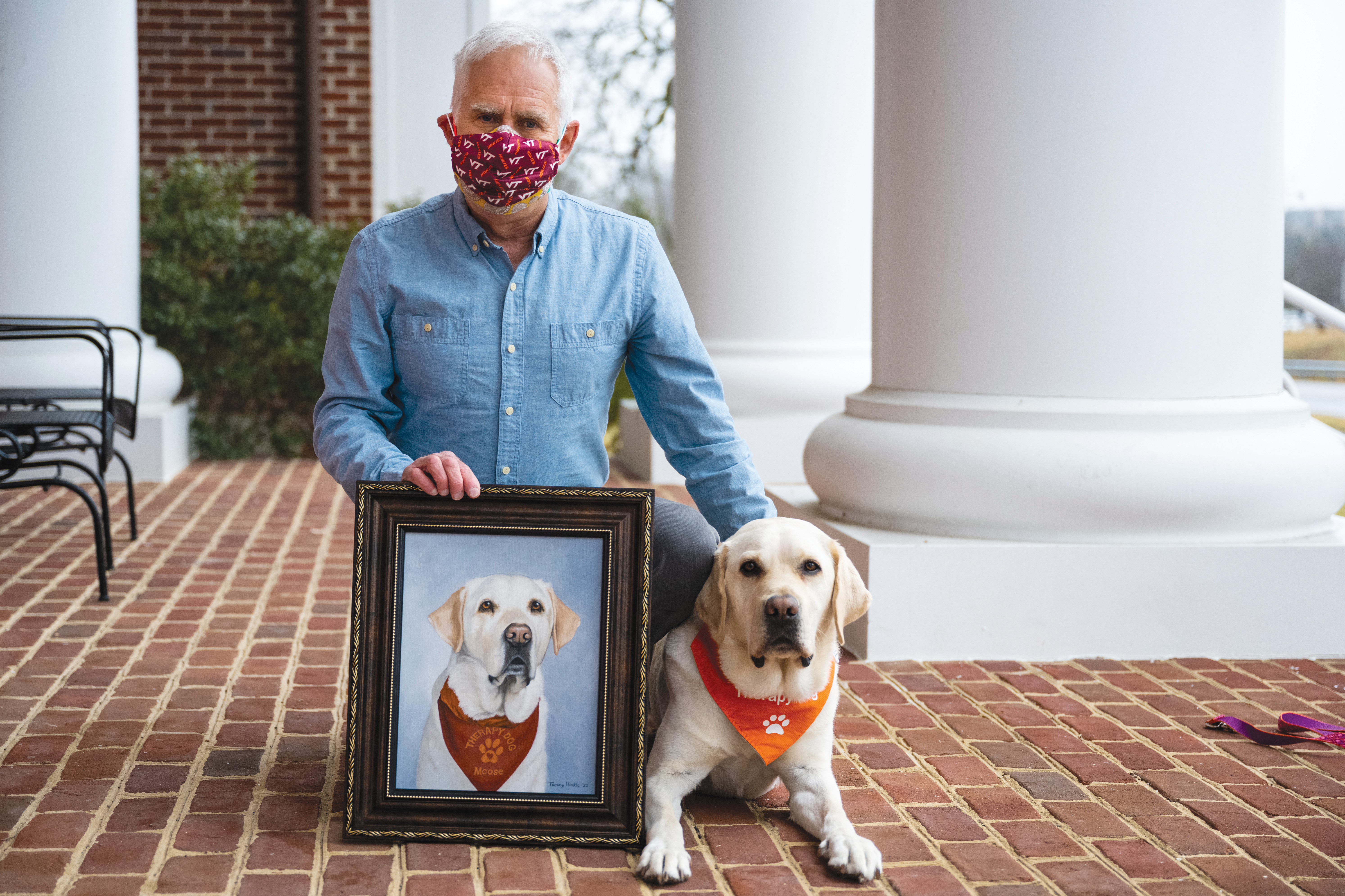 Trent Davis and Derek with the portrait of Moose