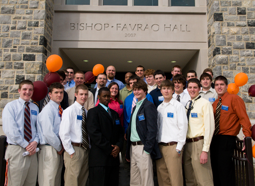 Students in front of bishop-Favrao Hall