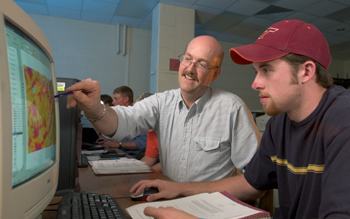 Professor Stephen Prisley with a student