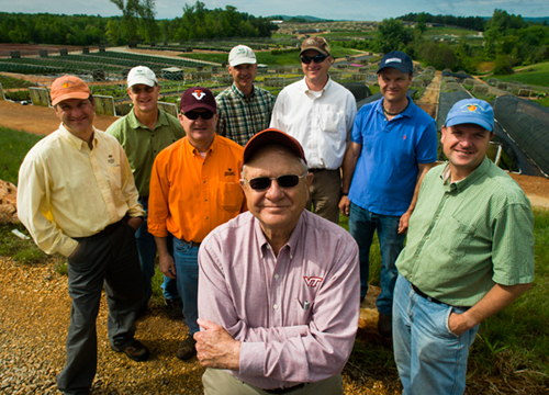 Paul Saunders '54 with sons (in back) left to right: Jim '85, Tom '81, Paul "Massie" Jr. '80, Bennett '83, John '89, Sam '91, and Robert '86.