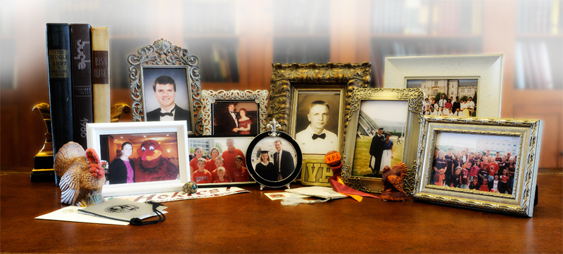 Photos of the Echols-Saunders family are surrounded by memorabilia from the family and the Holtzman Alumni Center's Alumni Museum.