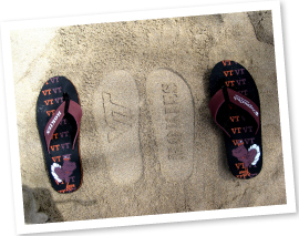 Hokie flip-flops on Waikiki Beach on Oahu, Hawaii