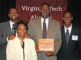 Winston Samuels '80, '83, pictured with sons Courtney '07 (left) and Joel, a senior at Tech, and his wife, Marilyn '82, was named the Department of Animal and Poultry Sciences' 2007-08 Outstanding Alumnus. Photo by Lori Greiner.