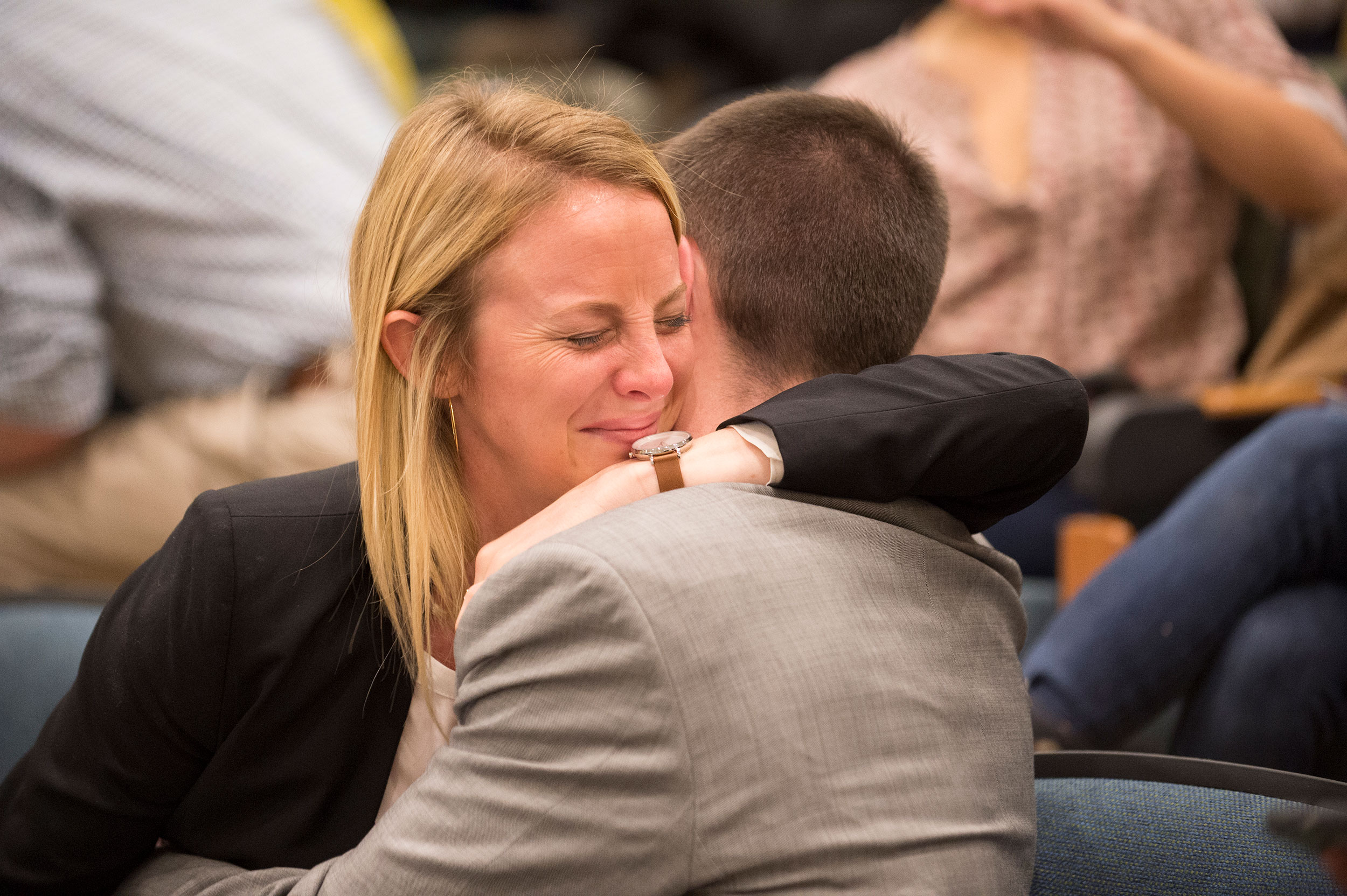 Caroline Reist (’18) hugs her fiancé Chris McLaughlin (’17)