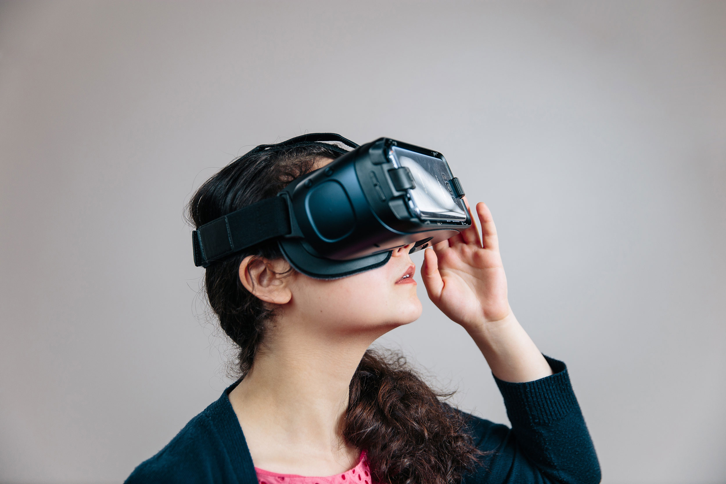 Maria Jernigan demonstrates a virtual reality headset