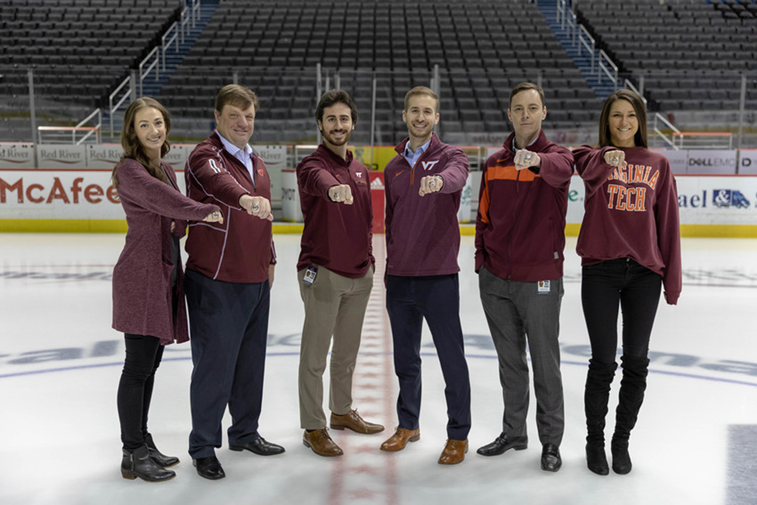 on the ice: From left to right: Megan Garner, Darren Montgomery, Travis Lucente, Ryan Shapiro, Greg Turner, and Lauren Zavaleta