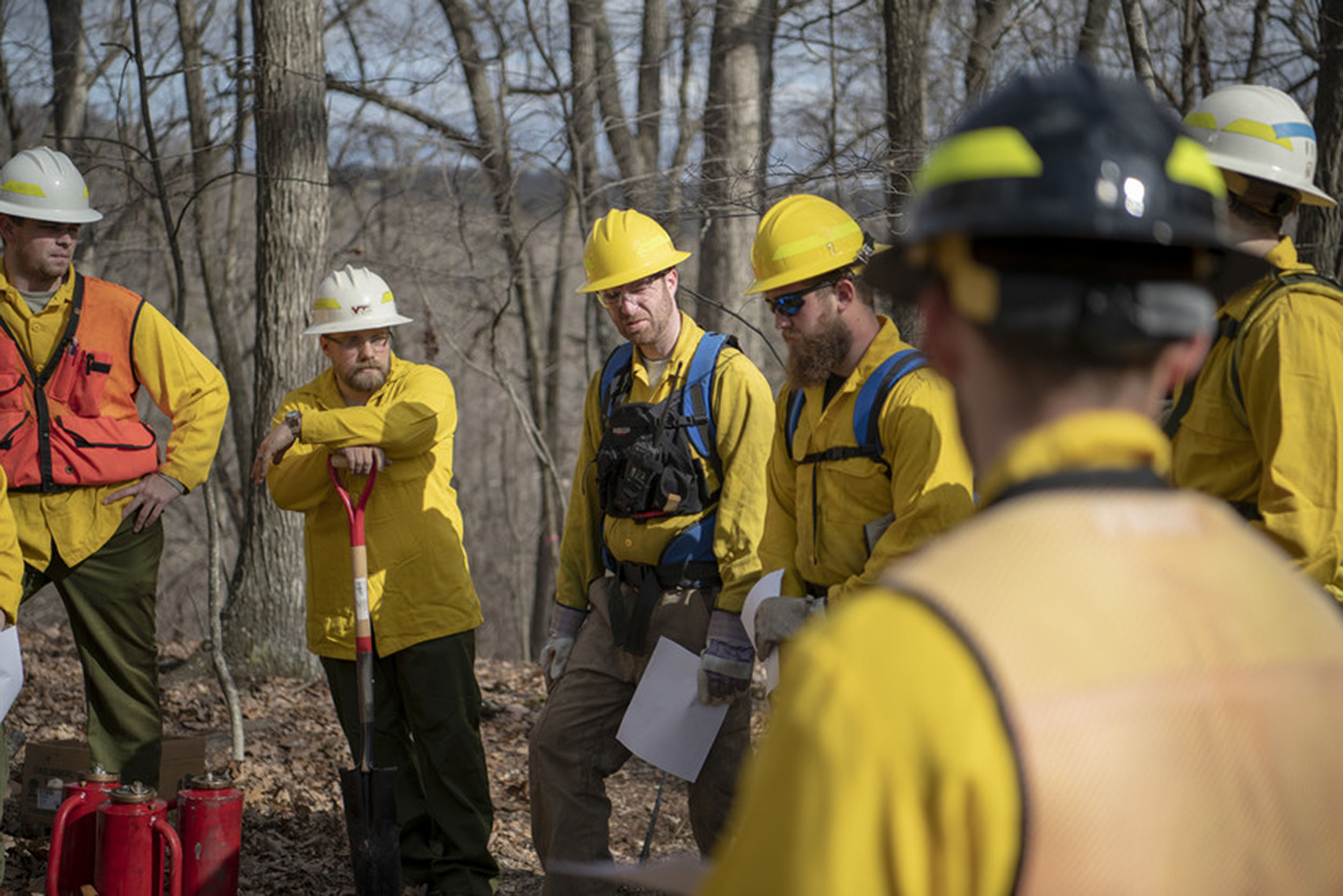 The pre-burn briefing, which includes task assignments and a review of safety measures, is a critical part of any prescribed burn