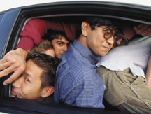 students in a VW bug